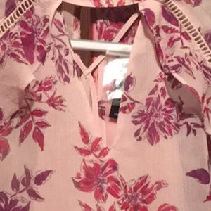 Express shirt never Worn. Tags are still on it