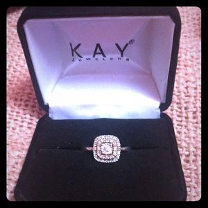 A diamond rose gold ring.