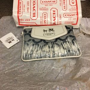 NWT small. Wristlet. Great xmas gift