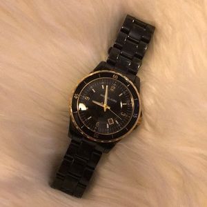 Michael Kors watch black and gold with large face