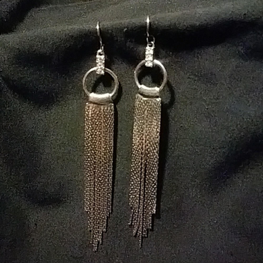 Pretty liquid silver drop earrings not real silver