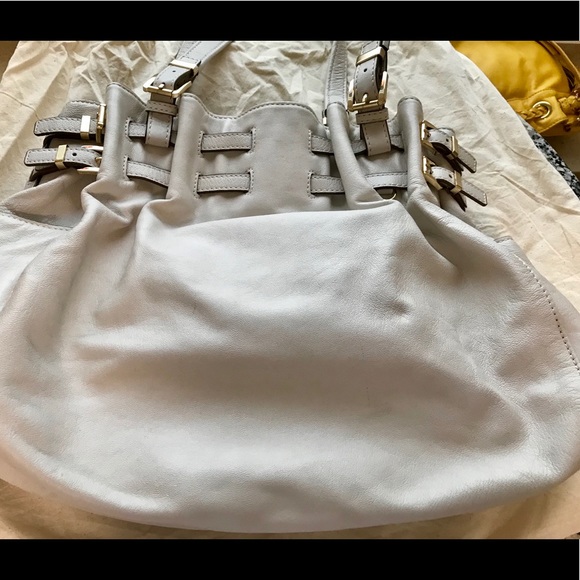 Michael Kors Handbags - MK champagne colored handbag GUC
