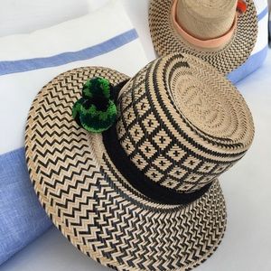 Iraka Palm Pom Pom hat, black and natural.