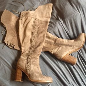 Knee high wide calf boots.