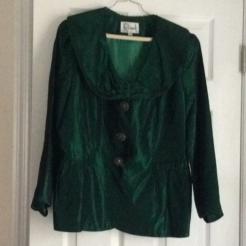 Dressy, emerald green top perfect for Christmas.