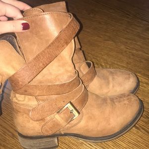 Steve Madden buckle boots.