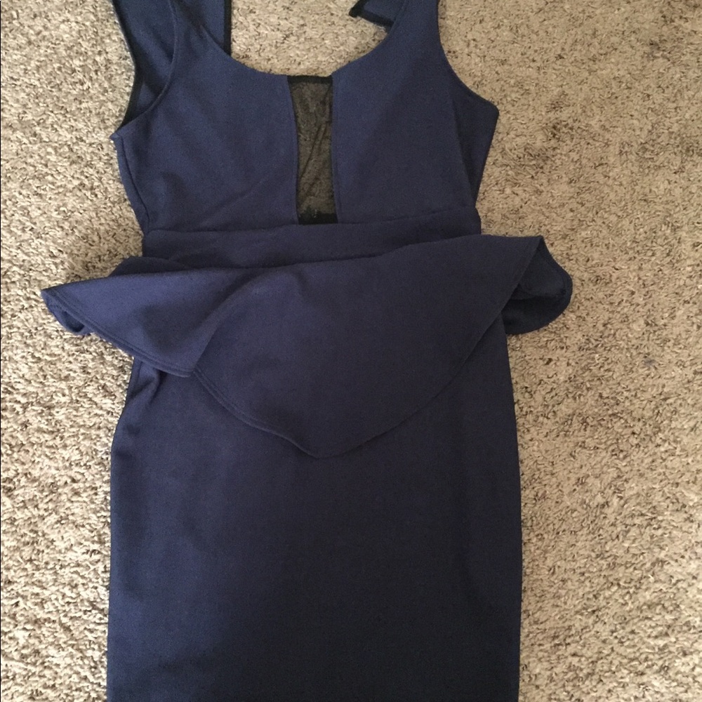 A navy blue mesh insert with tulle dress