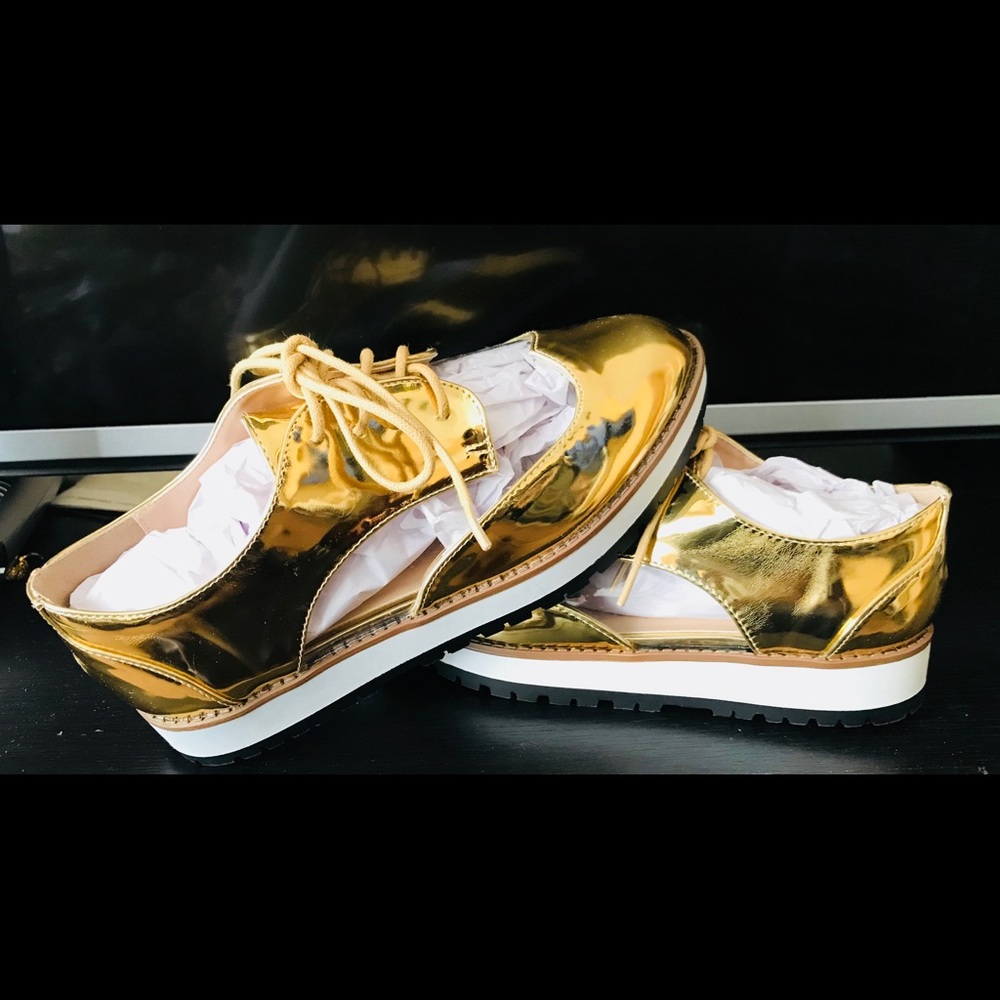 Gold Metallic/Transparent Oxford Platforms.