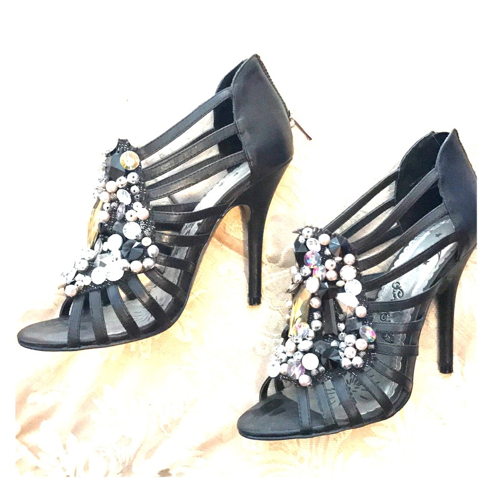 Black stiletto open toed high heel strappy shoes