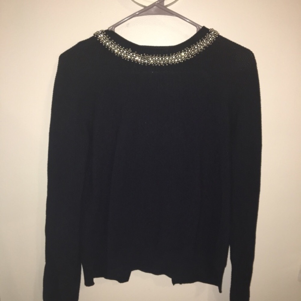 Navy blue with beaded neckline with open back.