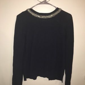 Navy blue with beaded neckline with open back.