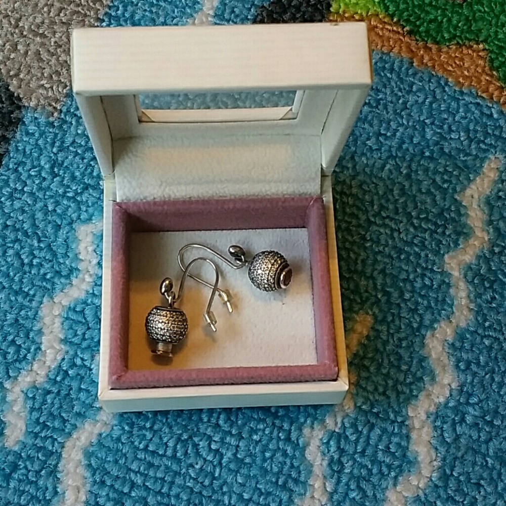 Pandora earrings .