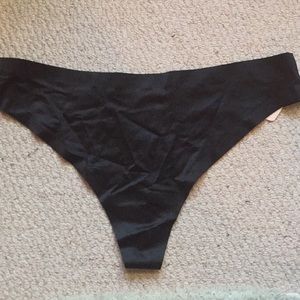 Black nearly seamless thong