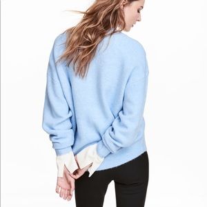Baby blue pill over sweater