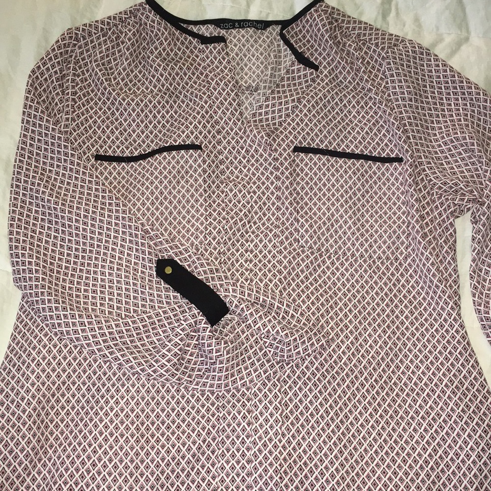 Red black and white blouse.
