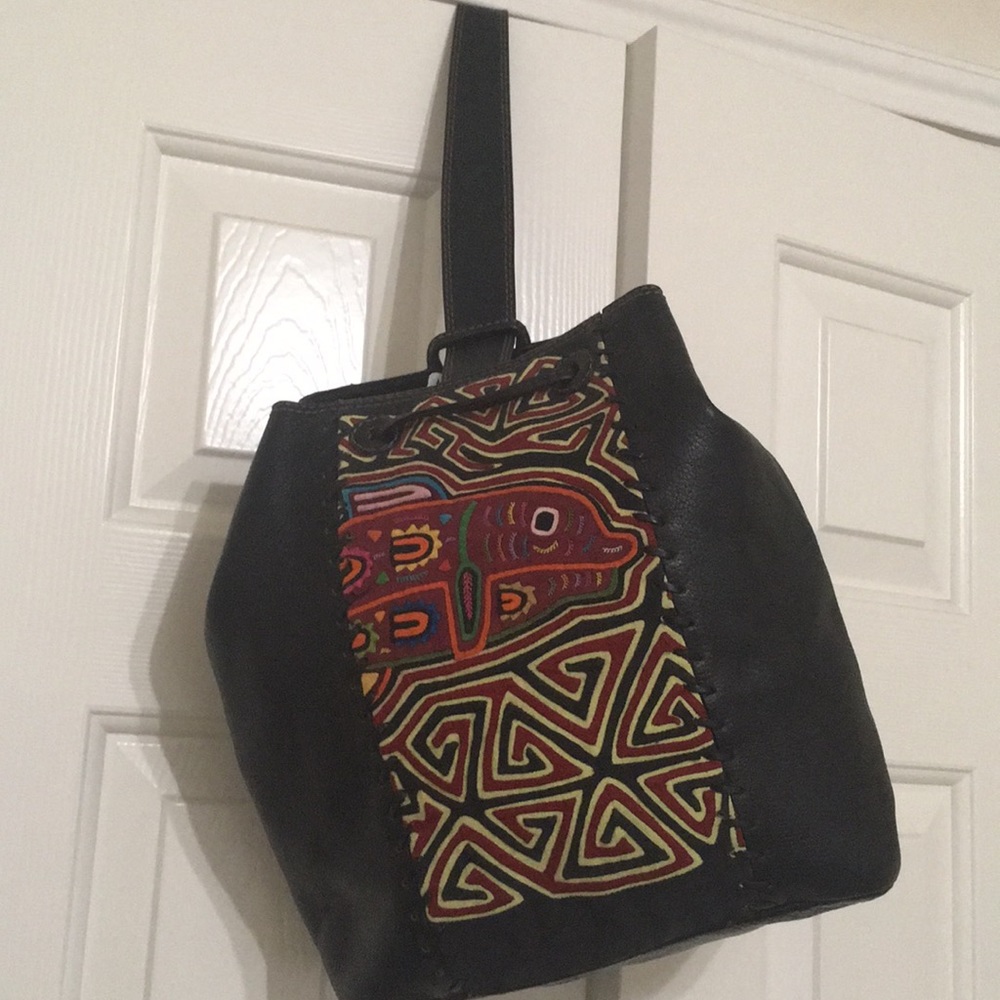 Vintage leather shoulder bag/backpack