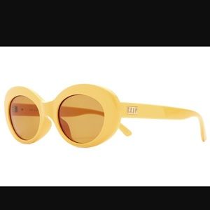 Mustard yellow retro ‘crap eyewear’ sunglasses