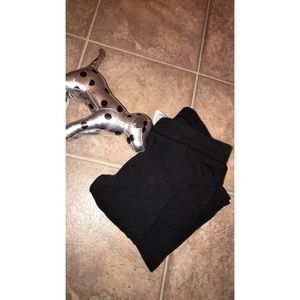 Victoria’s Secret leggings with plush dog