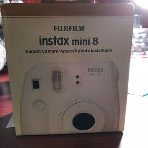 Never been opened white Polaroid camera