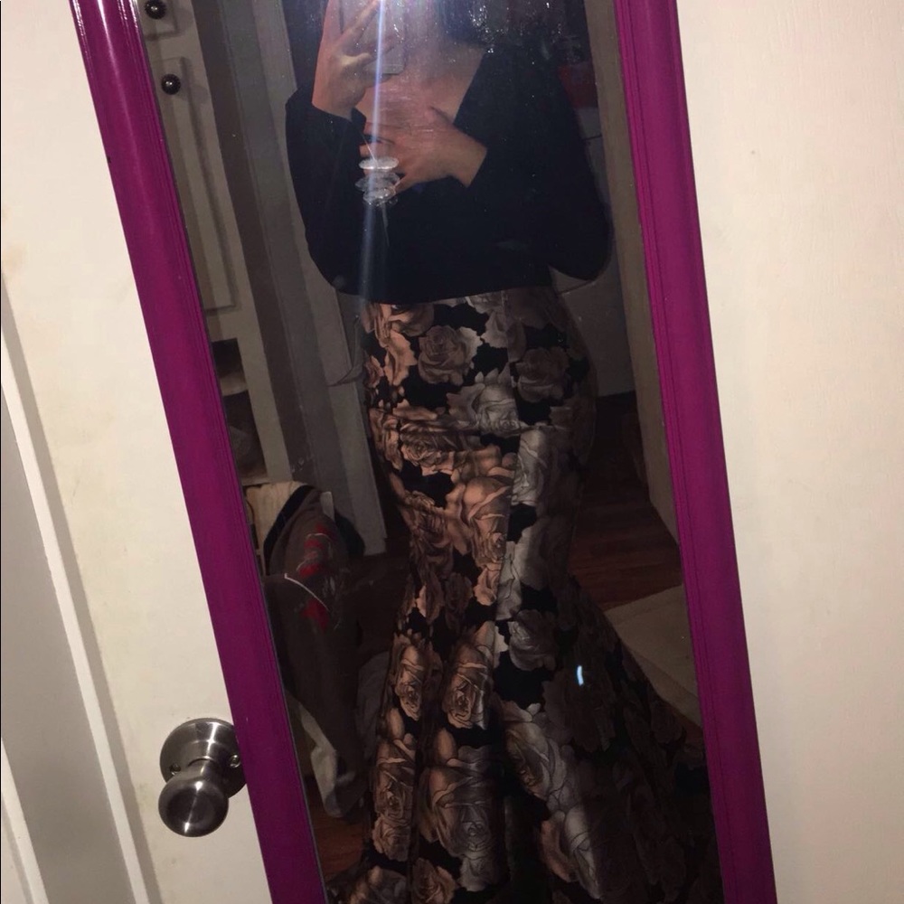 Black long sleeved form fitting with roses