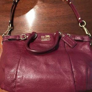 Coach leather bag in a beautiful plum color.