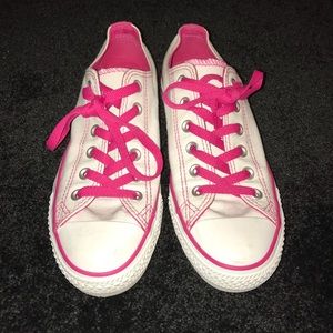 White and pink low top converse