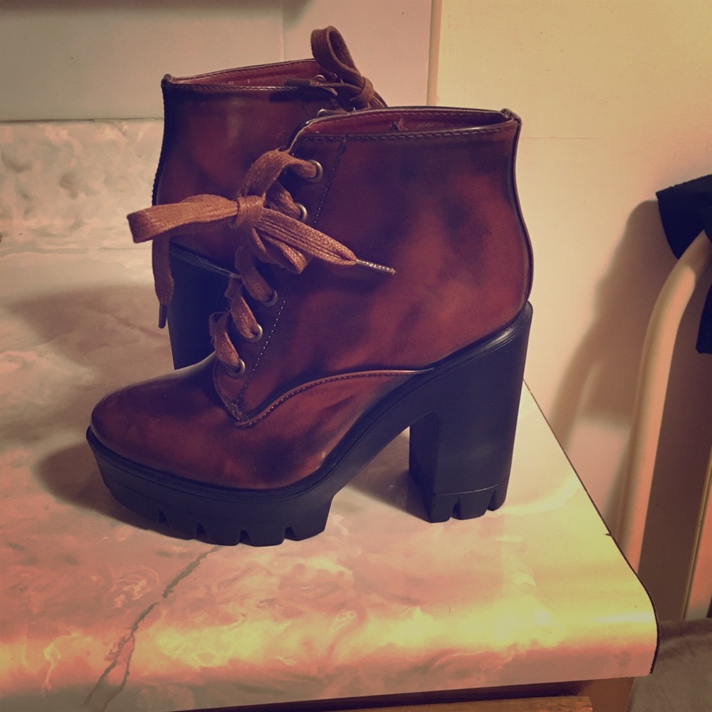 Brown and black laced booties