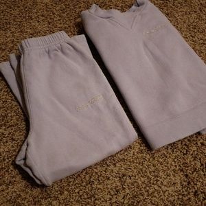 Girls purple Reebok sweat pants and shirt