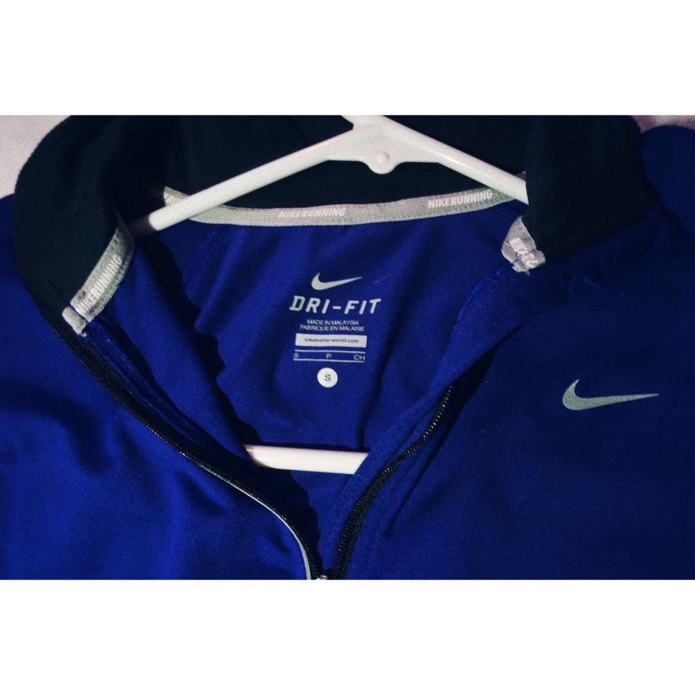 Nike blue light jacket.