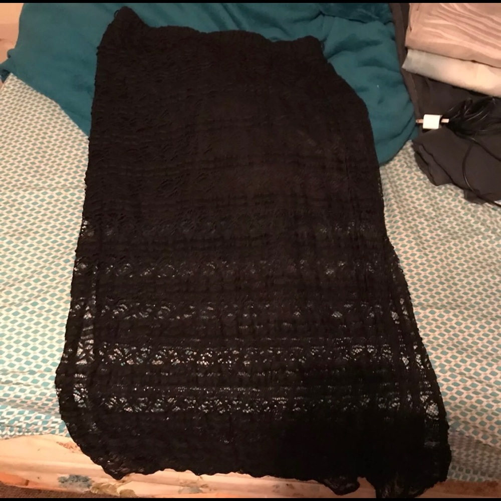 Lace skirt with slid black mini skirt underneath