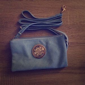 NWOT! BRAND NEW light blue cross body or wristlet