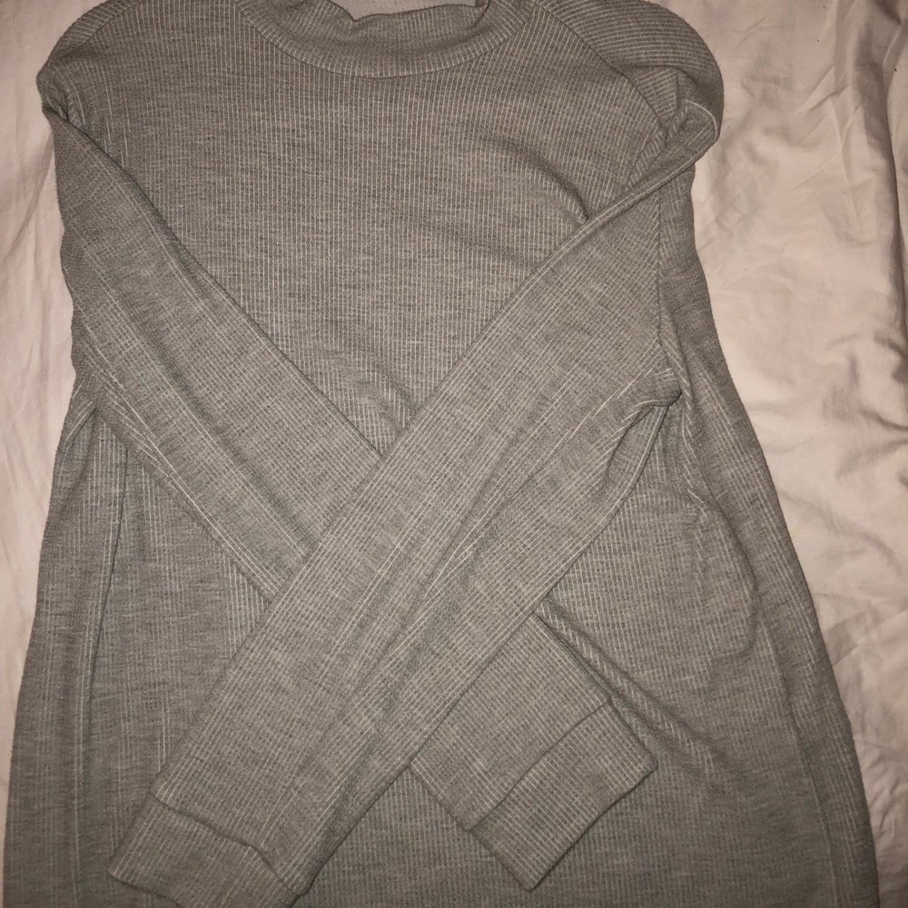A grey turtleneck sweater