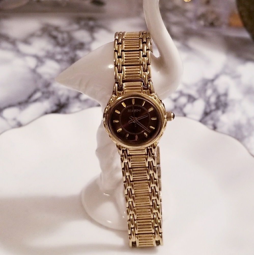 Gold Elgin watch.