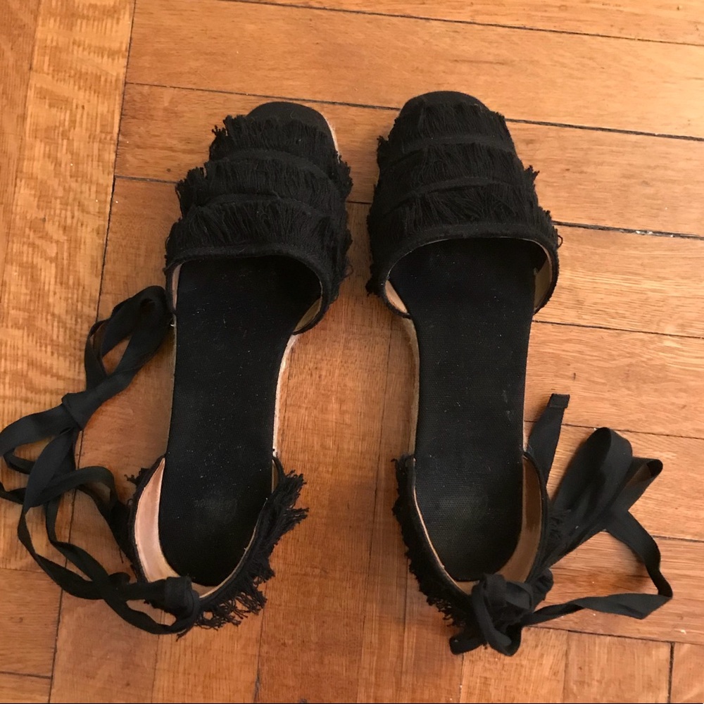 Black flat fringe espadrilles