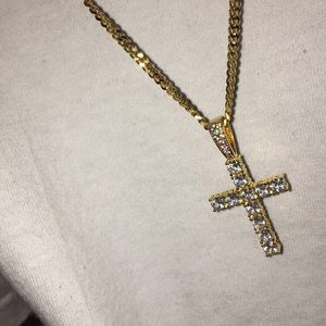 Gold chain with diamond cross pendant