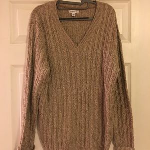 Light brown cable-knit V-neck sweater