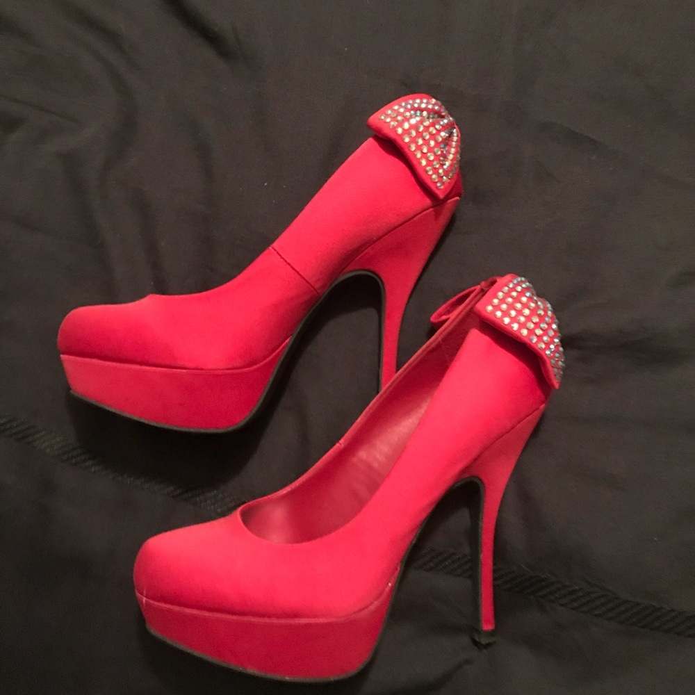 Red heels with sparkly bow in the back
