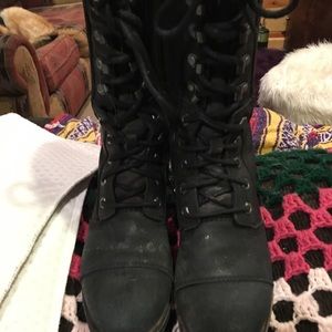 Black Sorel leather combat style boots