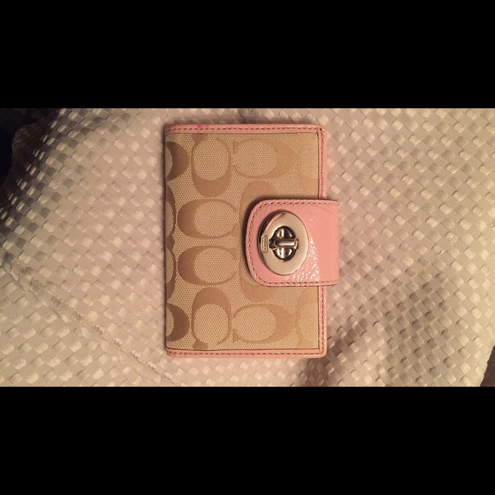 Coach wallet signature with pink trim