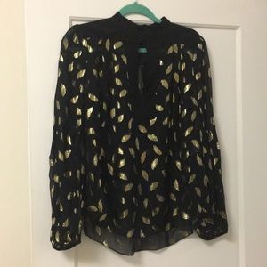 Fun sheer black DvF blouse with gold detailing
