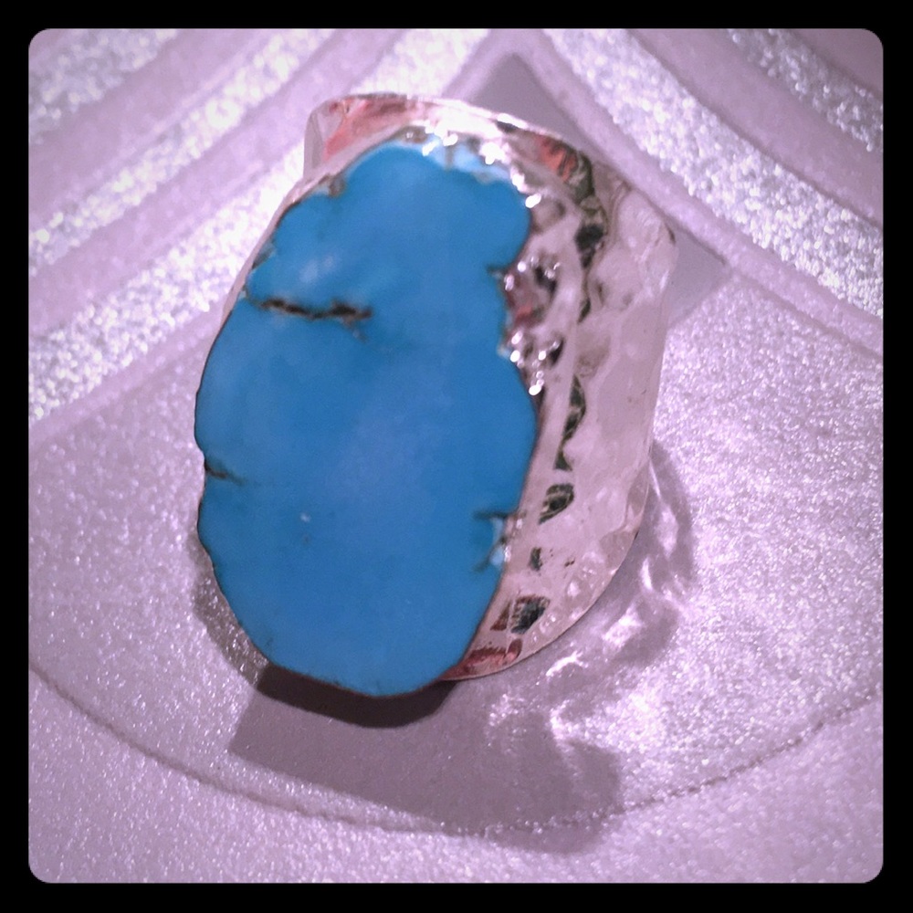 Silver adjustable ring with turquoise stone