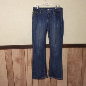 Jeans with embellished pockets