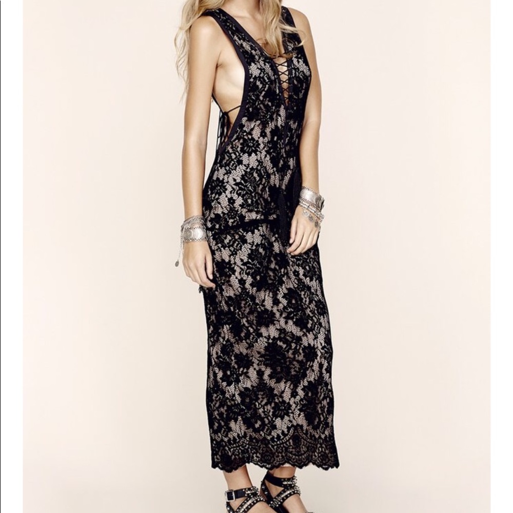 black lace up low cut dress from planet blue