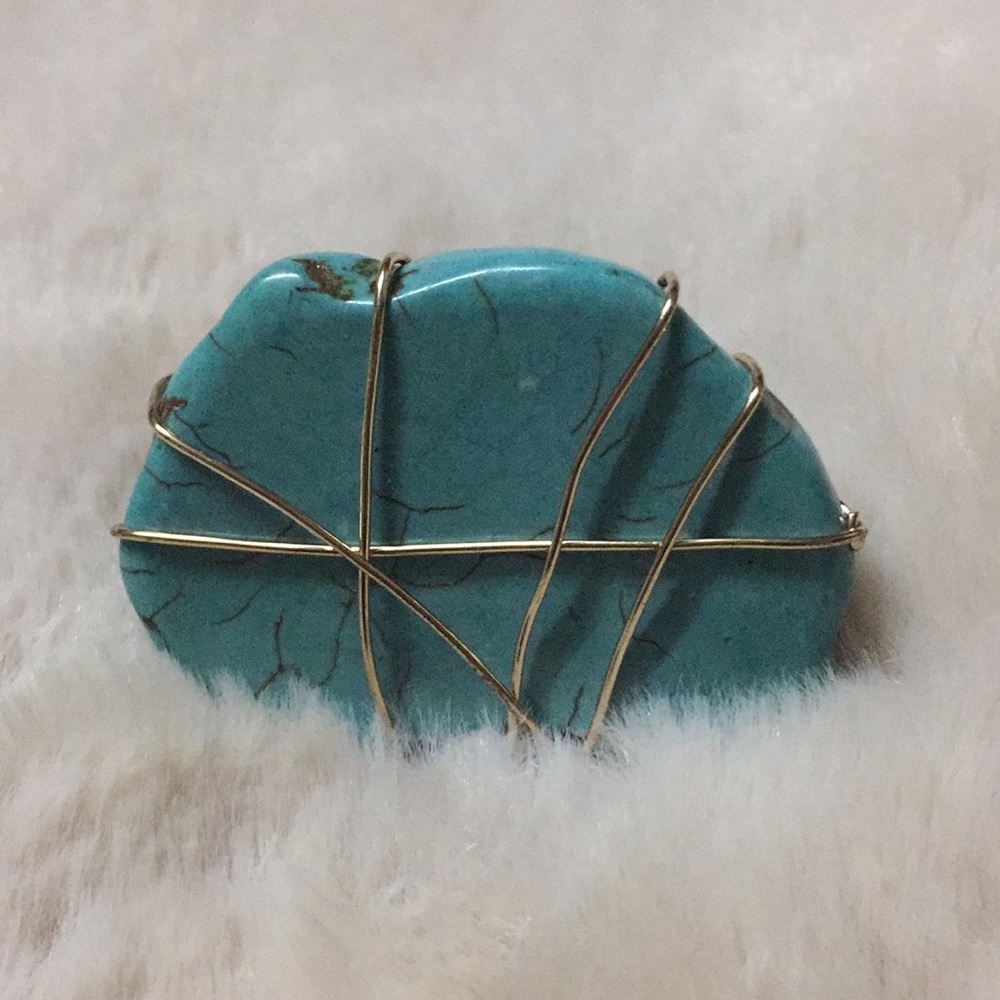 Wire wrapped ring with turquoise stone