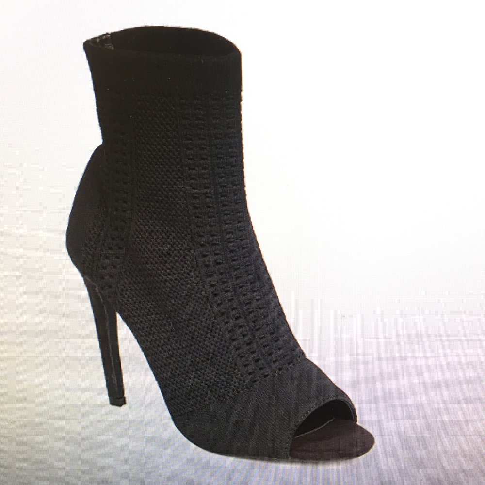 Brand new black sock booties. Still in box.