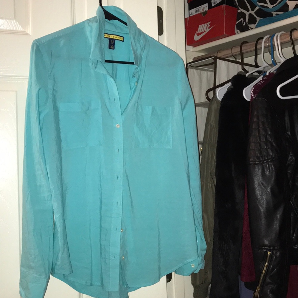 Blue button down collared shirt