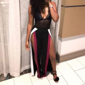 Open-slit striped pants