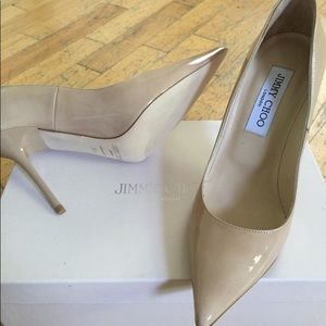 Never worn Jimmy Choo Nude patent leather pumps.