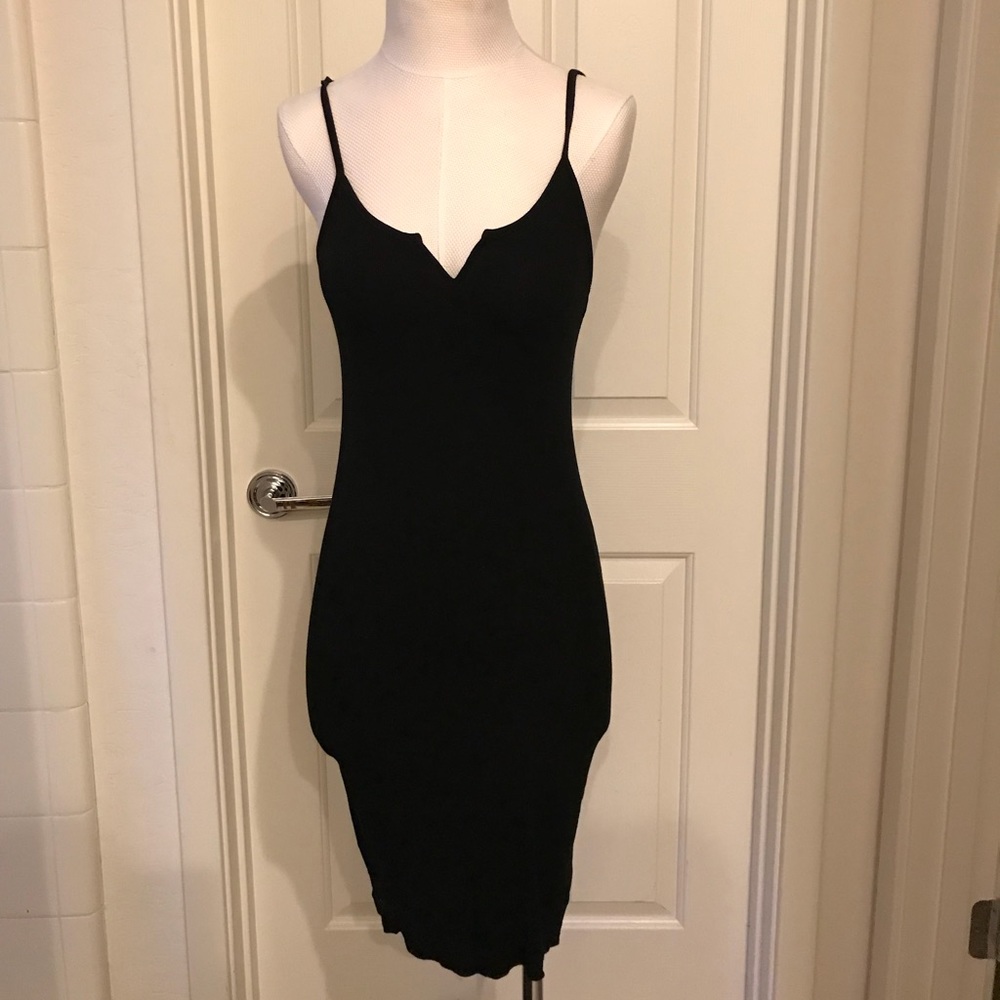 Closet staple! Ribbed fitted mid length dress