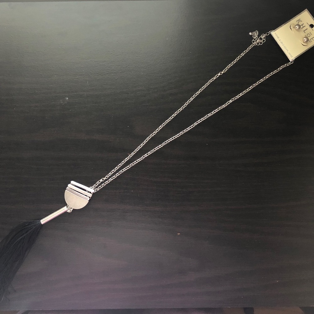 Silver toned long necklace